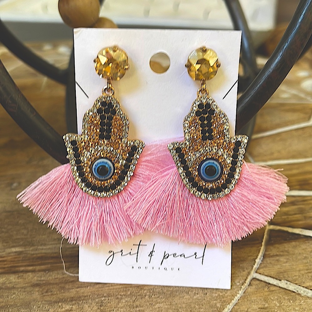 Pink evil eye tassel